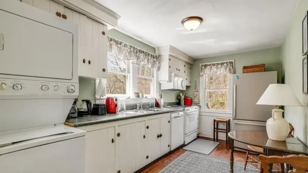 Tour This 1957 Farmhouse with Detached Garage Apartment Near Downtown Marshall, NC (Floor Plan Included)