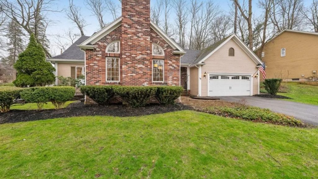 Colonial Home with Brick Facade