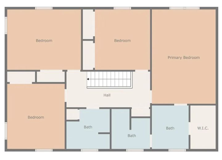 A simple floor plan of an upper level with four bedrooms, two baths, a hall, and a W.I.C.