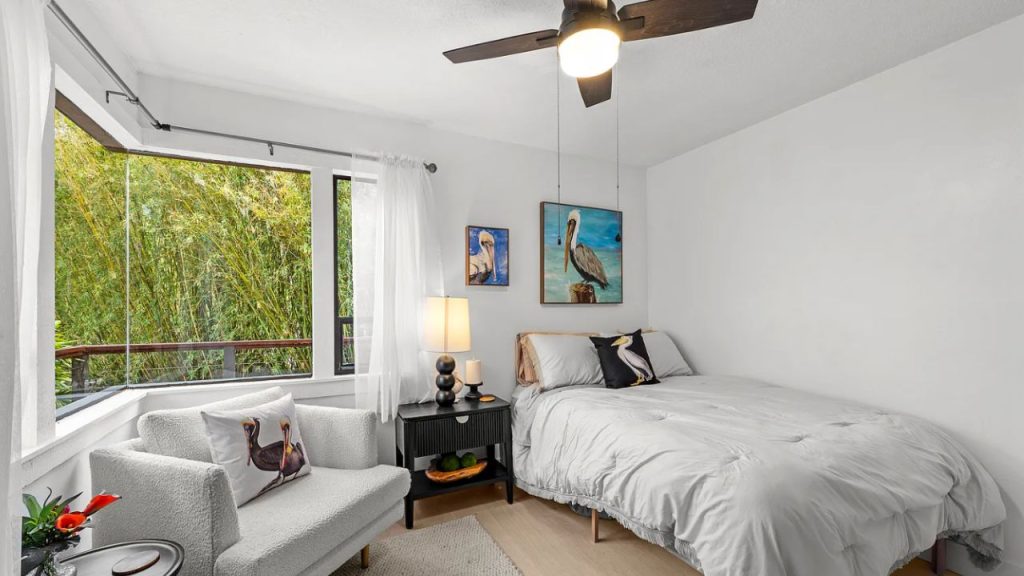 Bright Bedroom with Forest Views