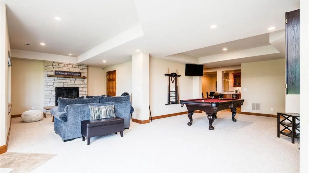 Entertainment Room with Stone Fireplace