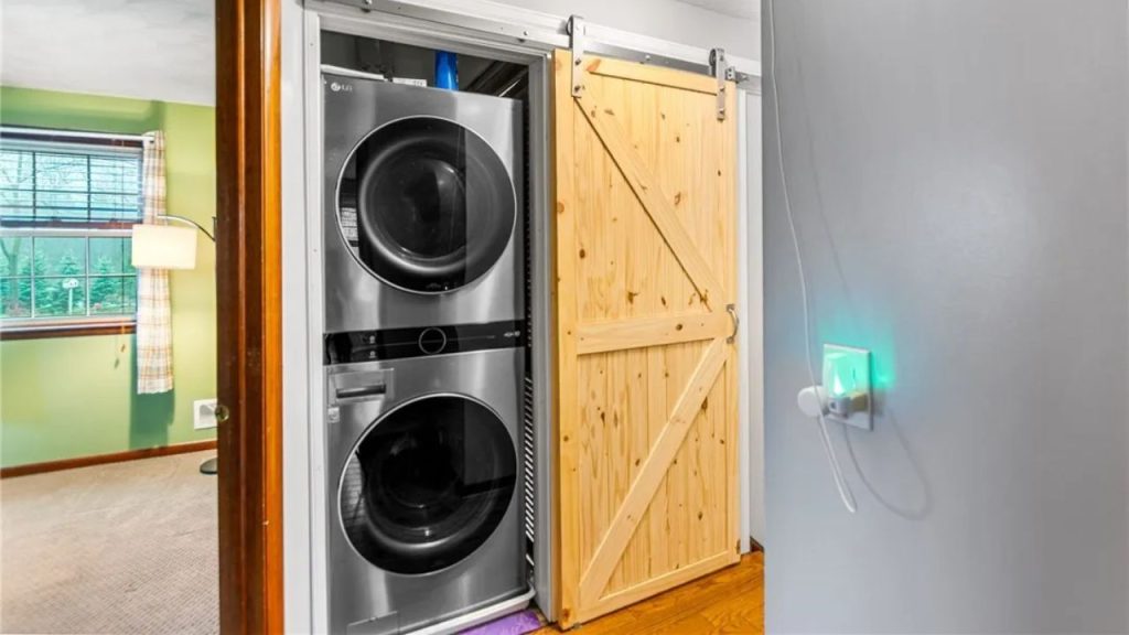 Compact Laundry with Barn Door Charm