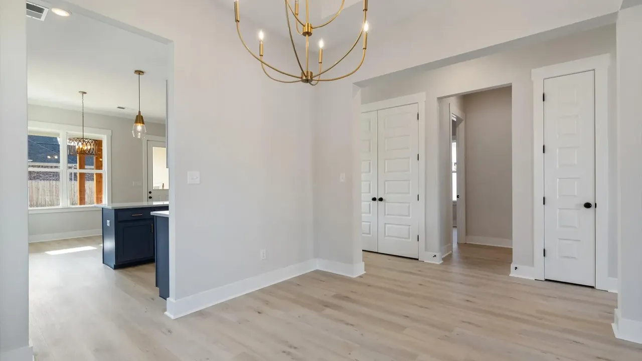 Discover a Modern Elevation Home with Gable Arch and Tongue-and-Groove Porch Ceiling in Hernando Mississippi (Floor Plan Included)