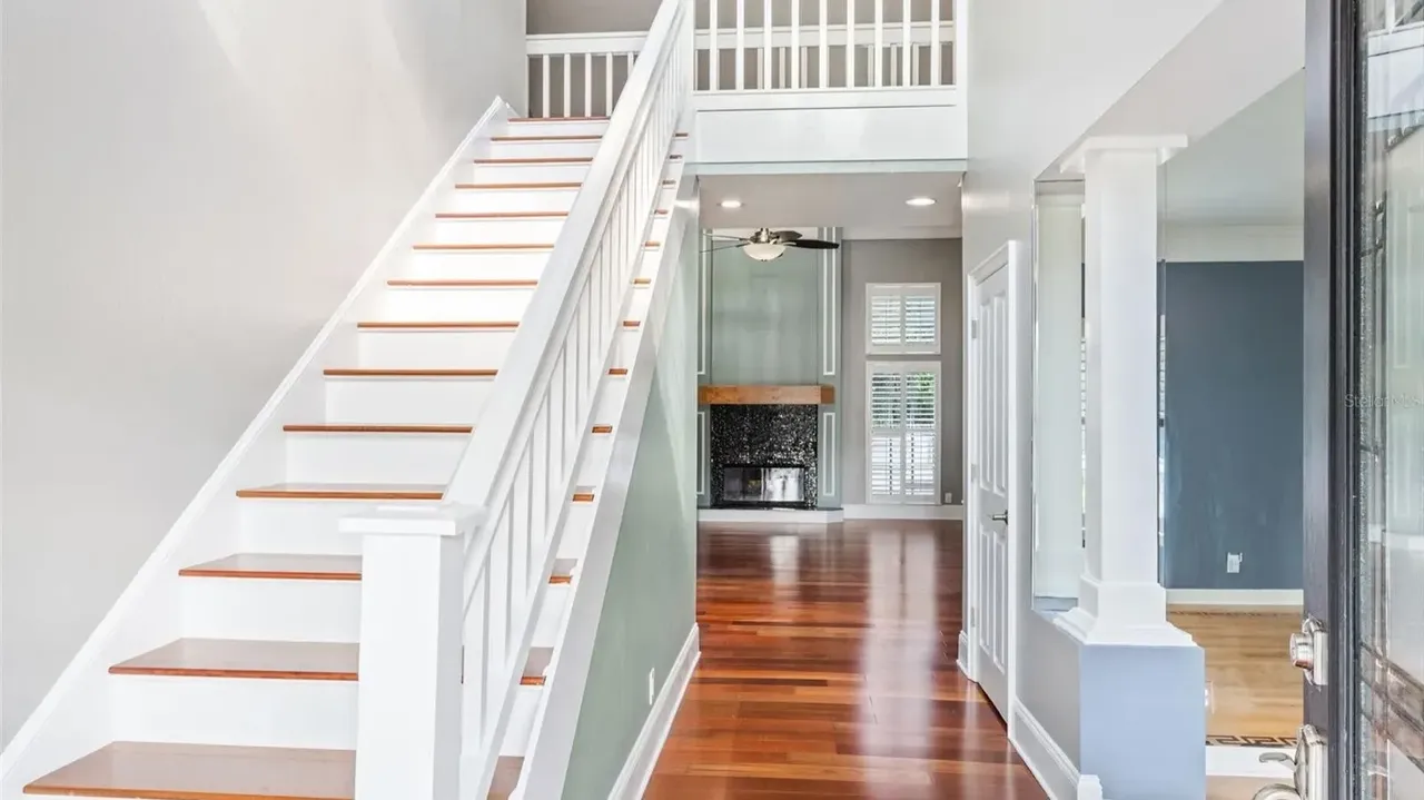 Tour This Stunning 1992 4-Bedroom Key West Style Home with Wraparound Porch in Oldsmar, FL (Floor Plan Included)