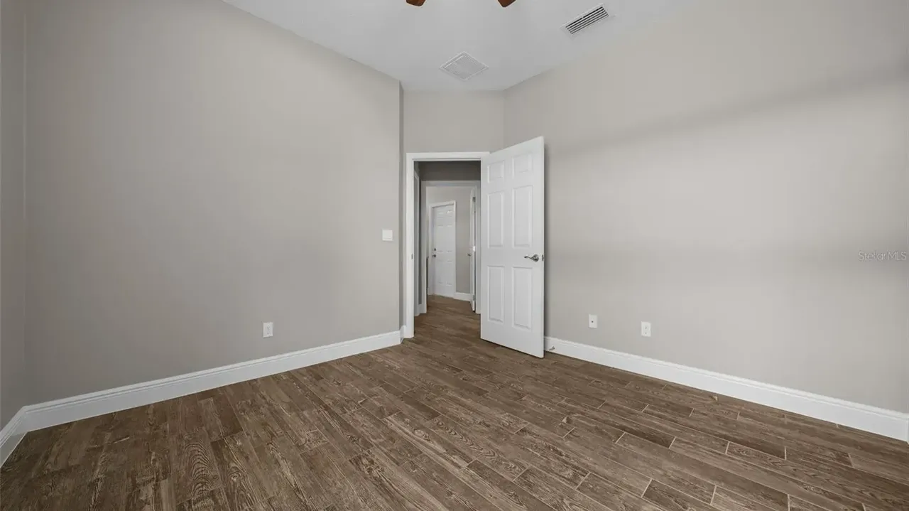 Discover This Bright and Open 3-Bedroom 1,685 Sq-Ft Ranch-Style Home with Granite Counters and Large Pantry in Groveland, FL (Floor Plan Inside)