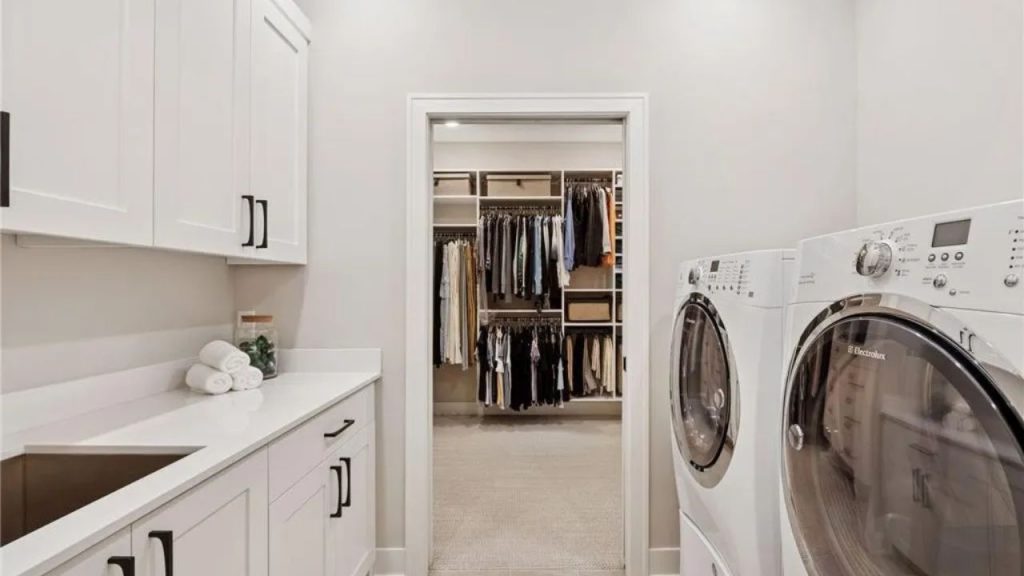 Laundry Room with Walk-In Closet Access