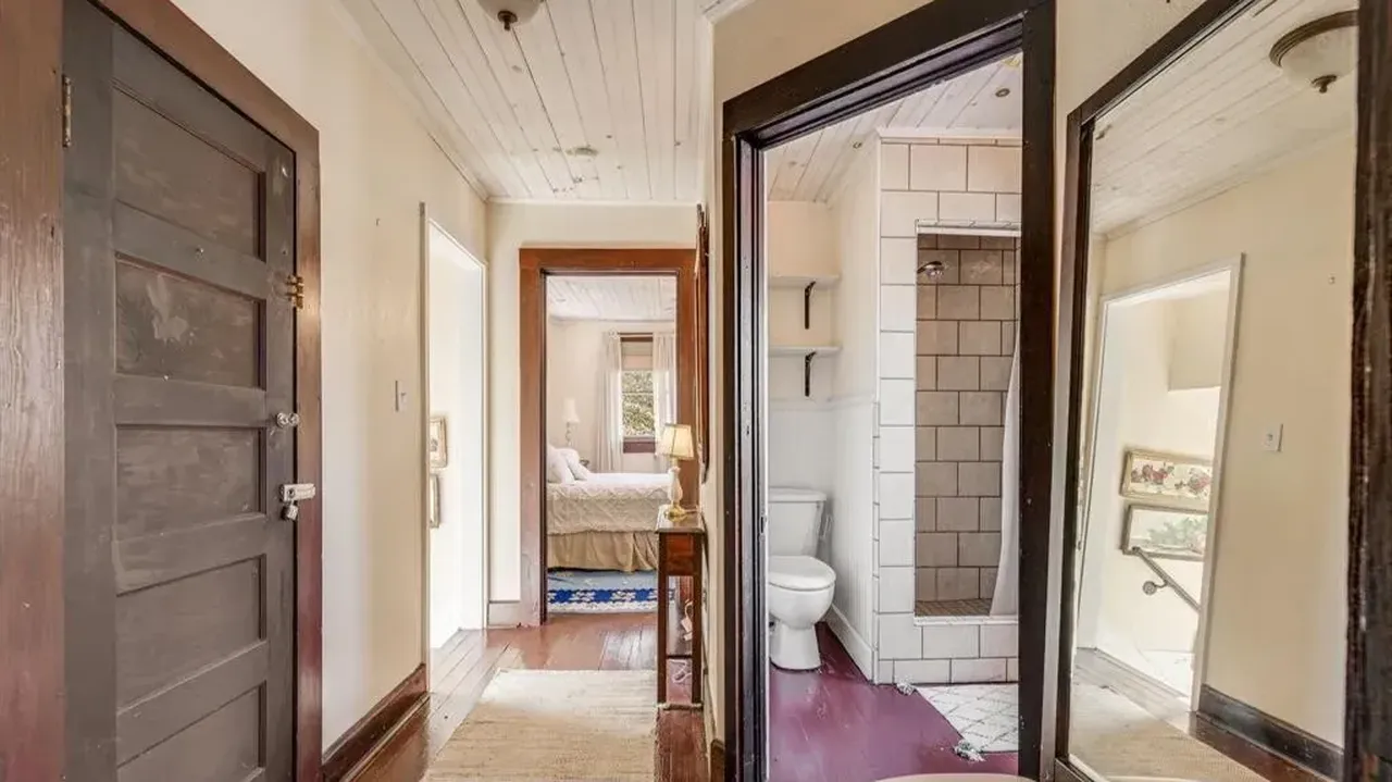 Tour This 1957 Farmhouse with Detached Garage Apartment Near Downtown Marshall, NC (Floor Plan Included)