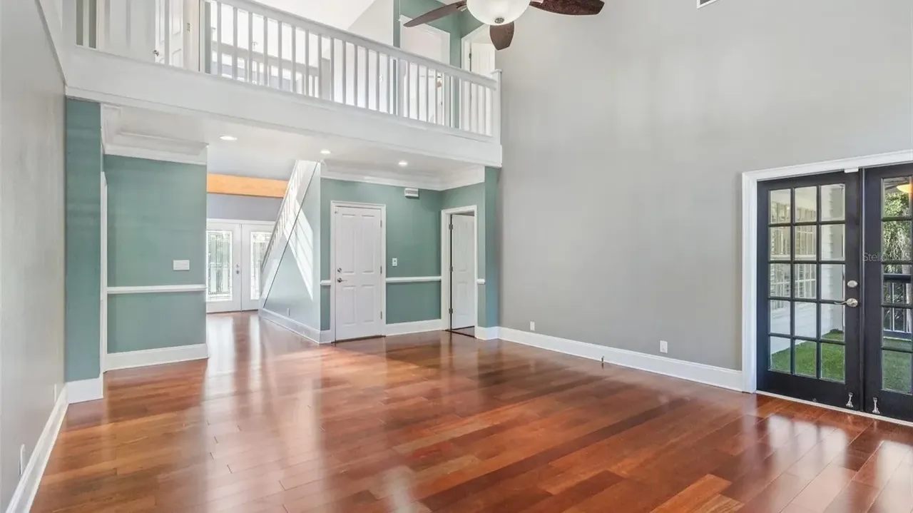 Tour This Stunning 1992 4-Bedroom Key West Style Home with Wraparound Porch in Oldsmar, FL (Floor Plan Included)