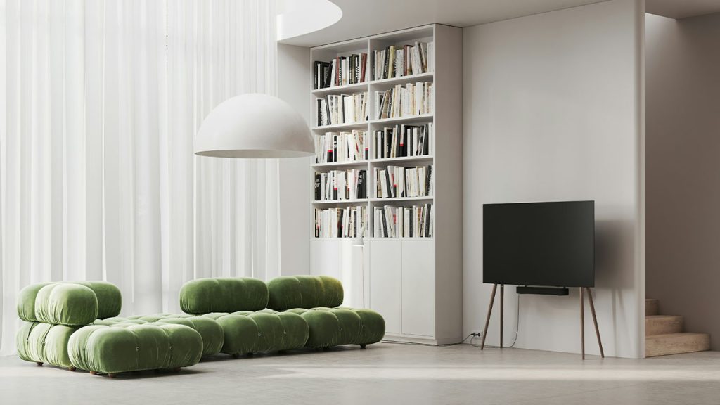 a living room filled with furniture and a flat screen tv