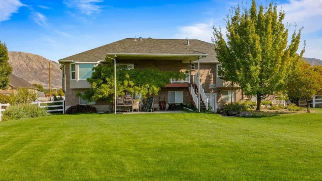 Scenic Backyard with Deck & Patio