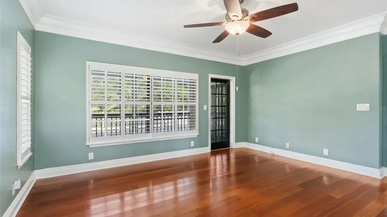 Tour This Stunning 1992 4-Bedroom Key West Style Home with Wraparound Porch in Oldsmar, FL (Floor Plan Included)