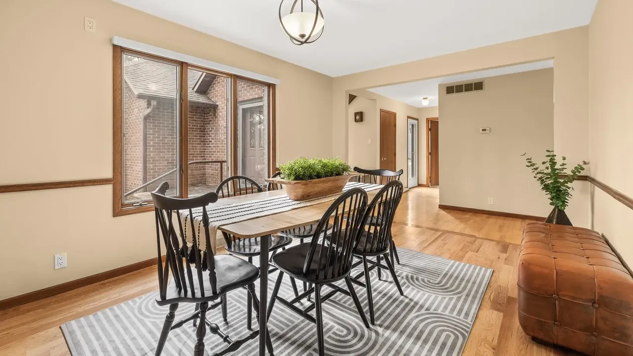 Experience Country Living in This 3-Bedroom Tudor with Garden and Wooded Trails in Stevens Point Wisconsin (Floor Plan Inside)