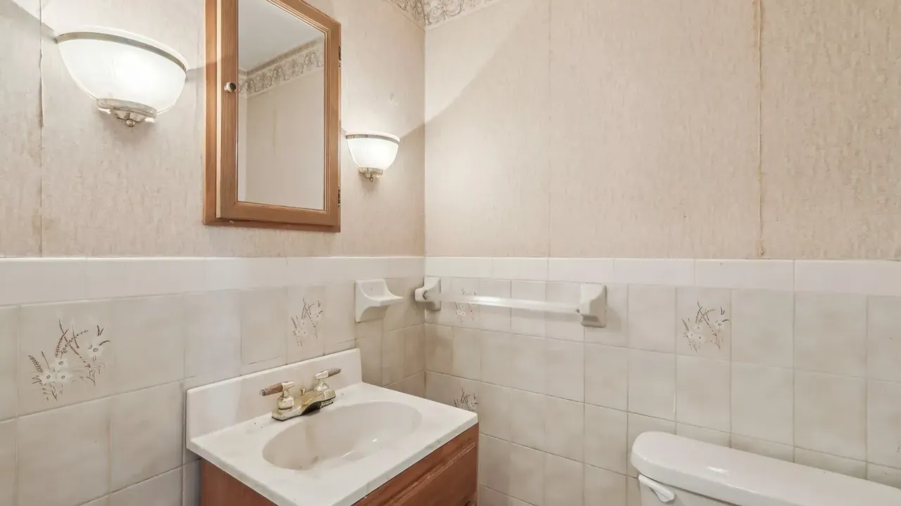 Explore This $699K Yonkers Tudor with Brick Facade and Access to Westchester Trailway. (Floor Plan Included)