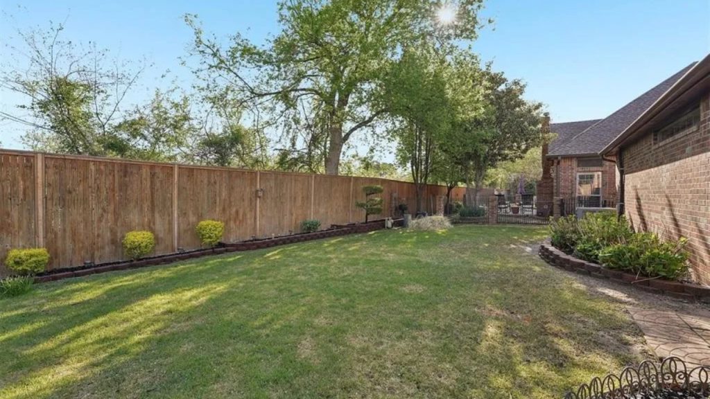 Private Backyard with Lush Lawn