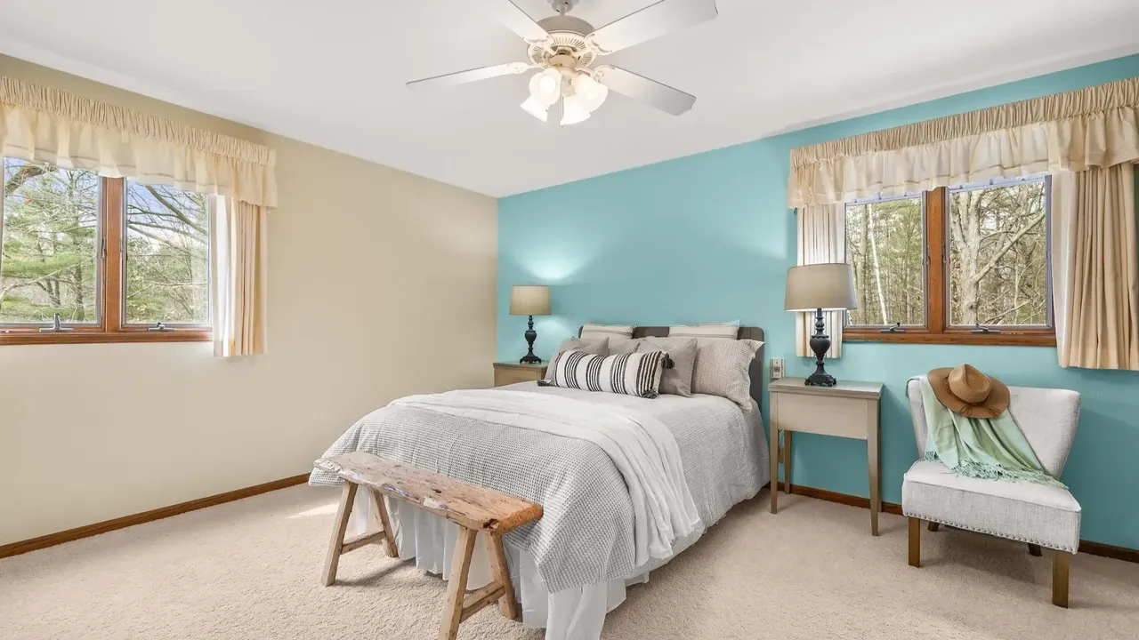 Experience Country Living in This 3-Bedroom Tudor with Garden and Wooded Trails in Stevens Point Wisconsin (Floor Plan Inside)