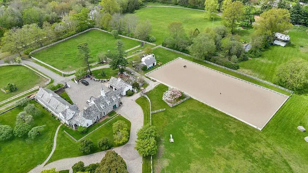 Tour This Majestic 1937 Estate in Greenwich with Tennis House, Ethereal Fountains, and 22 Acres of Beautifully Designed Land