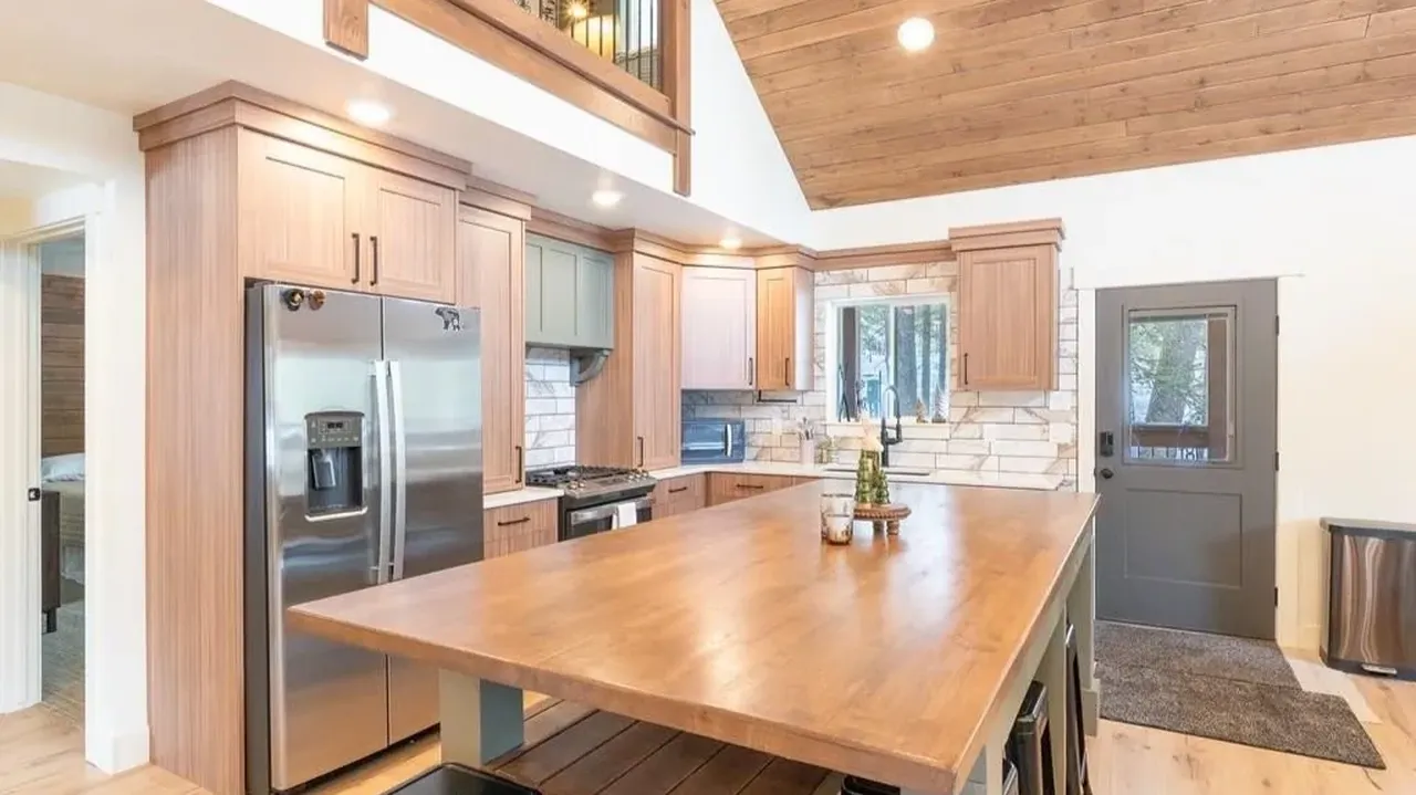 Discover Modern Comfort in This 6-Bedroom Cabin Nestled Among Towering Pine Trees Near Yellowstone! (Floor Plan Included)