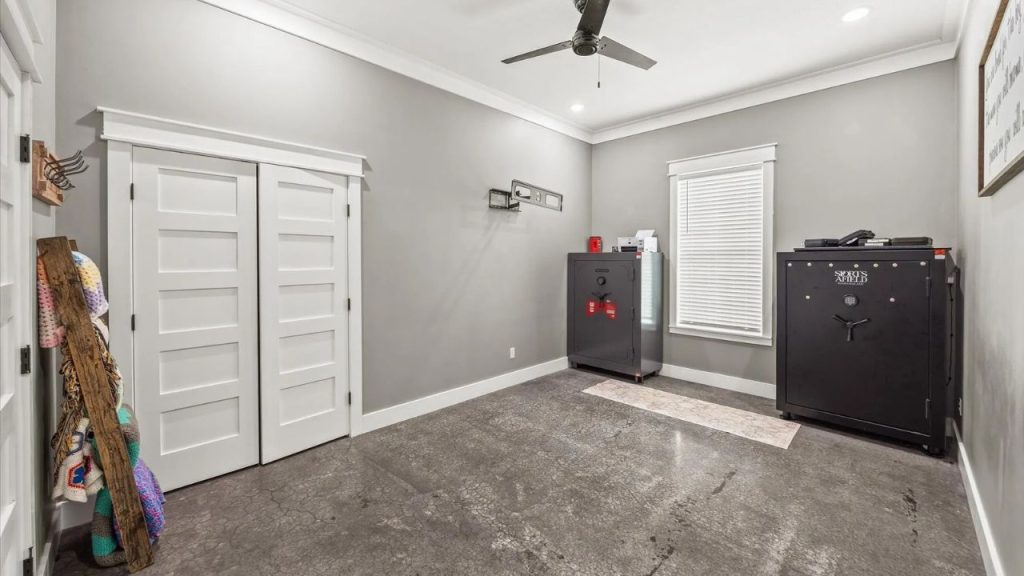 Secure storage room with large safes and a polished concrete floor.