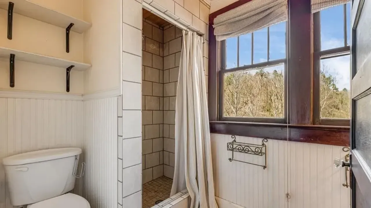 Tour This 1957 Farmhouse with Detached Garage Apartment Near Downtown Marshall, NC (Floor Plan Included)
