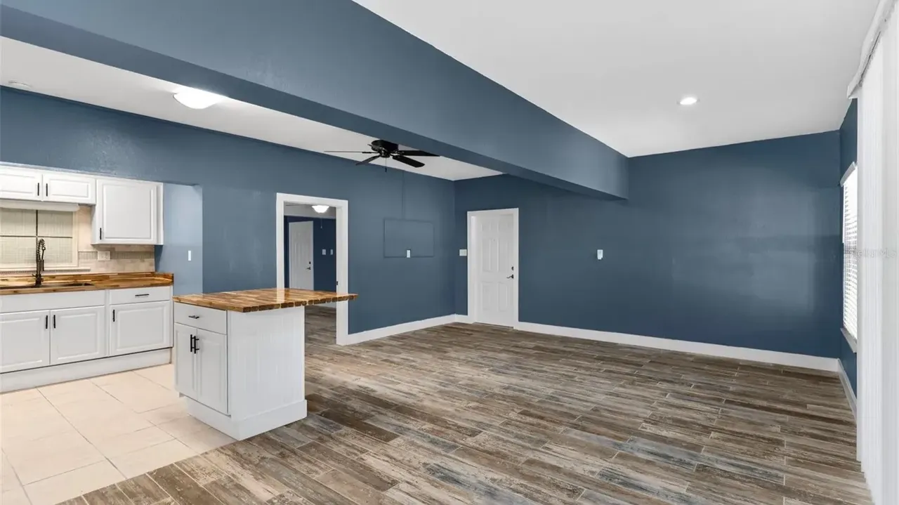 Tour This Stunning 1992 4-Bedroom Key West Style Home with Wraparound Porch in Oldsmar, FL (Floor Plan Included)