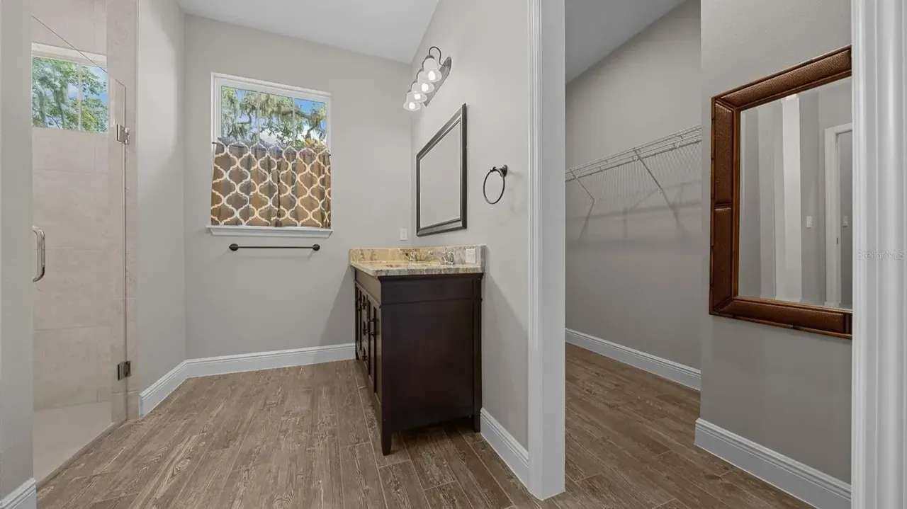 Discover This Bright and Open 3-Bedroom 1,685 Sq-Ft Ranch-Style Home with Granite Counters and Large Pantry in Groveland, FL (Floor Plan Inside)