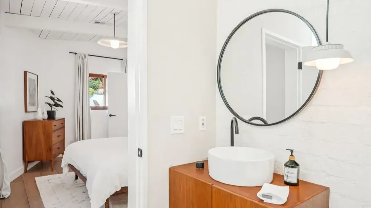 Tour This Hollywood Hills Mid-Century Gem With Pool, Hot Tub & Zen Vibes (Floor Plan Included)