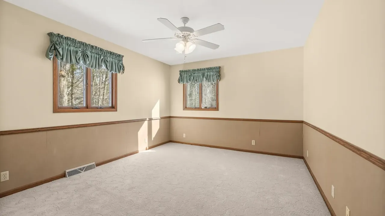 Experience Country Living in This 3-Bedroom Tudor with Garden and Wooded Trails in Stevens Point Wisconsin (Floor Plan Inside)