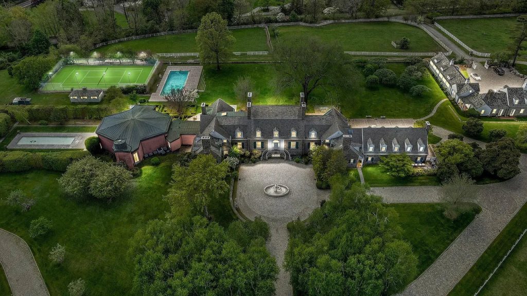 Tour This Majestic 1937 Estate in Greenwich with Tennis House, Ethereal Fountains, and 22 Acres of Beautifully Designed Land