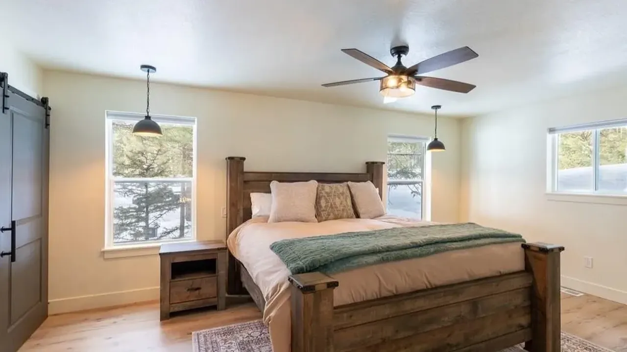 Discover Modern Comfort in This 6-Bedroom Cabin Nestled Among Towering Pine Trees Near Yellowstone! (Floor Plan Included)