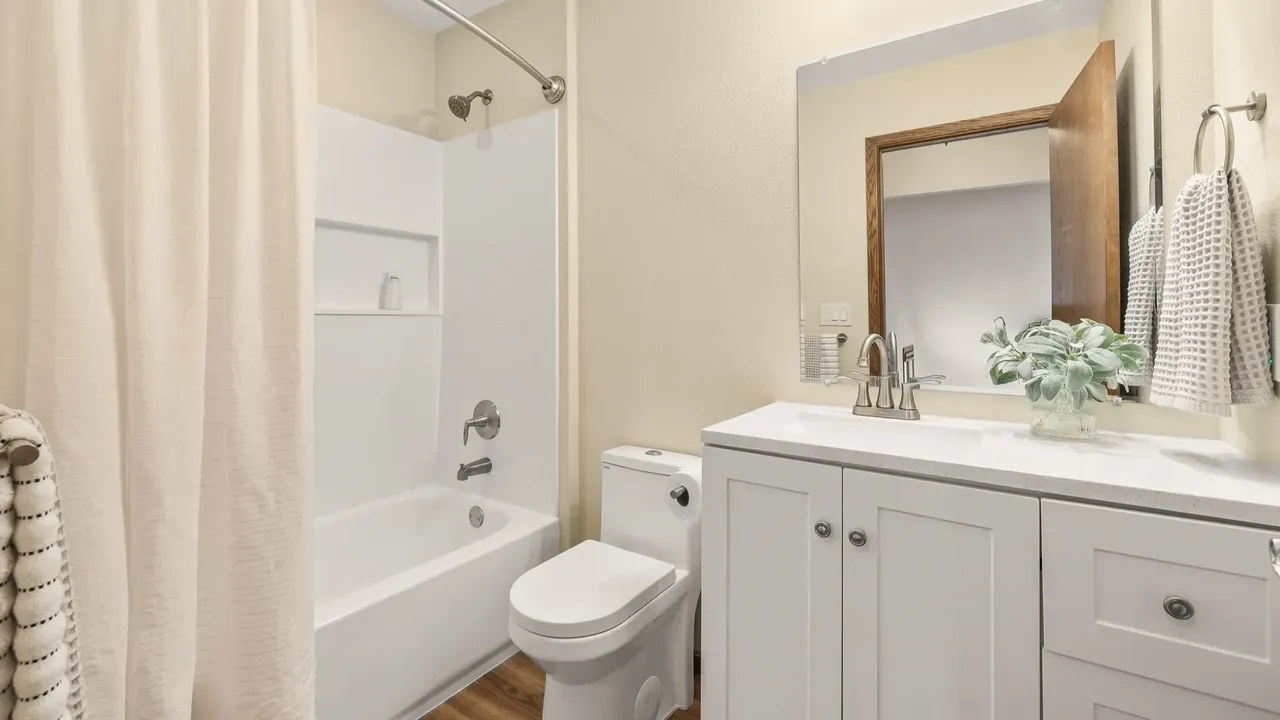 Experience Country Living in This 3-Bedroom Tudor with Garden and Wooded Trails in Stevens Point Wisconsin (Floor Plan Inside)