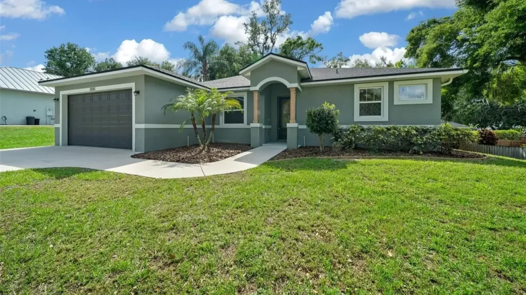 Discover This Bright and Open 3-Bedroom 1,685 Sq-Ft Ranch-Style Home with Granite Counters and Large Pantry in Groveland, FL (Floor Plan Inside)