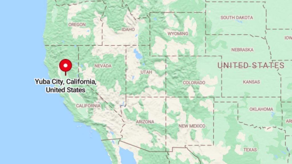 A map highlighting Yuba City, California, marked with a red pin, showing its location in Northern California near the Sierra Nevada mountains.
