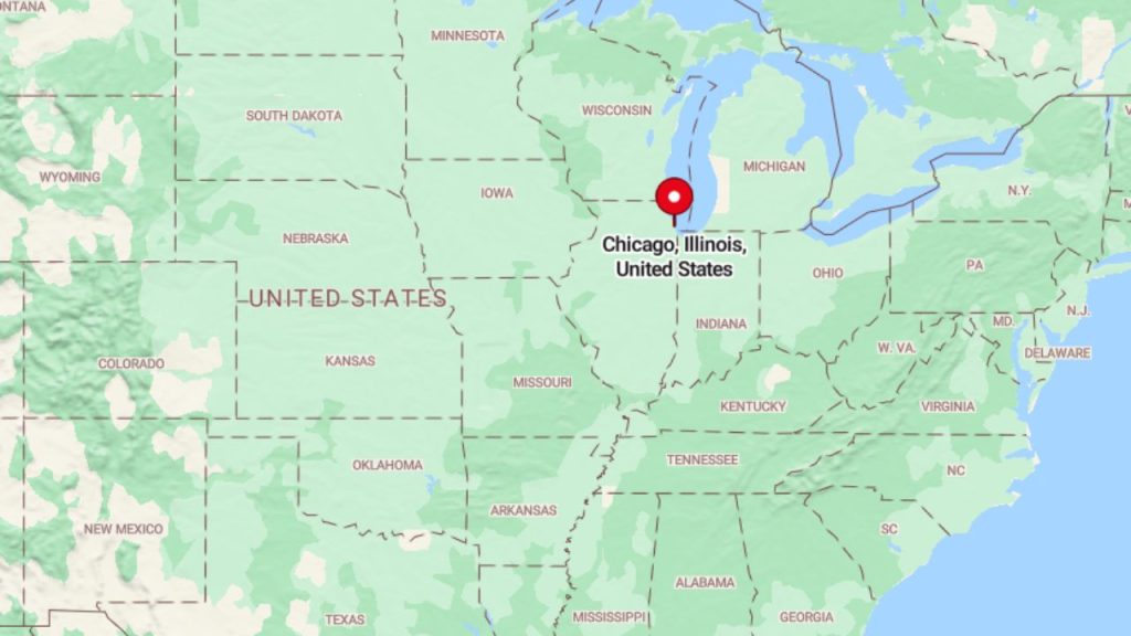 A U.S. map with a red pin marking Chicago, Illinois, surrounded by neighboring states like Wisconsin, Indiana, and Iowa, with Lake Michigan to the northeast.