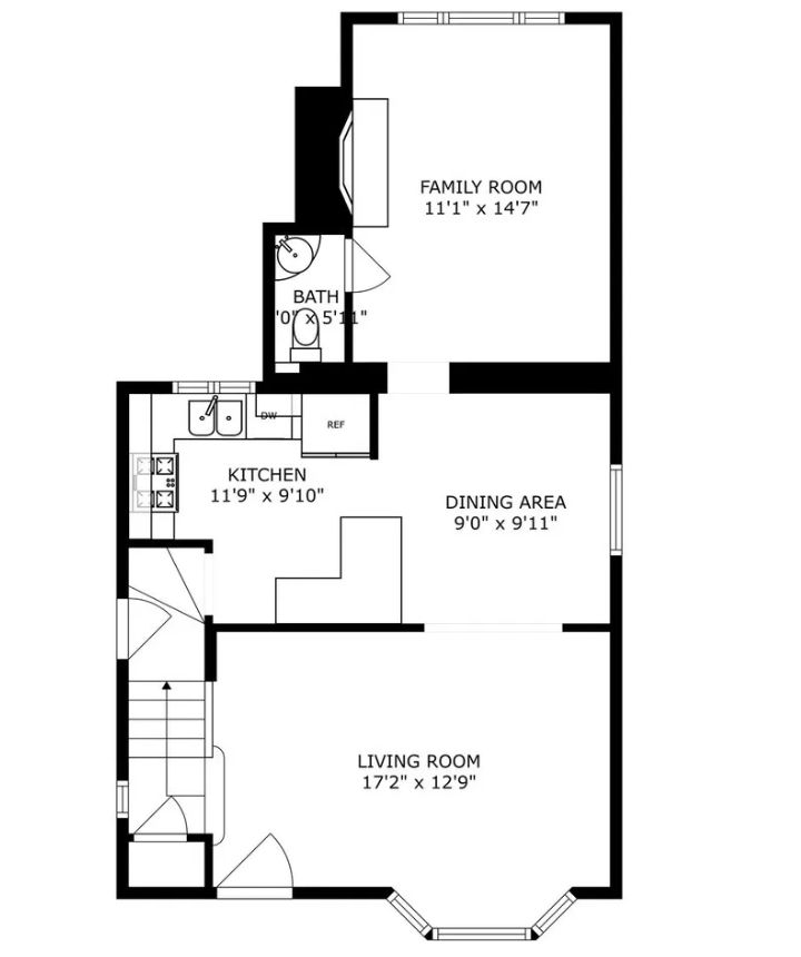 Floor plan showing living room, kitchen, dining area, family room, and half bath.