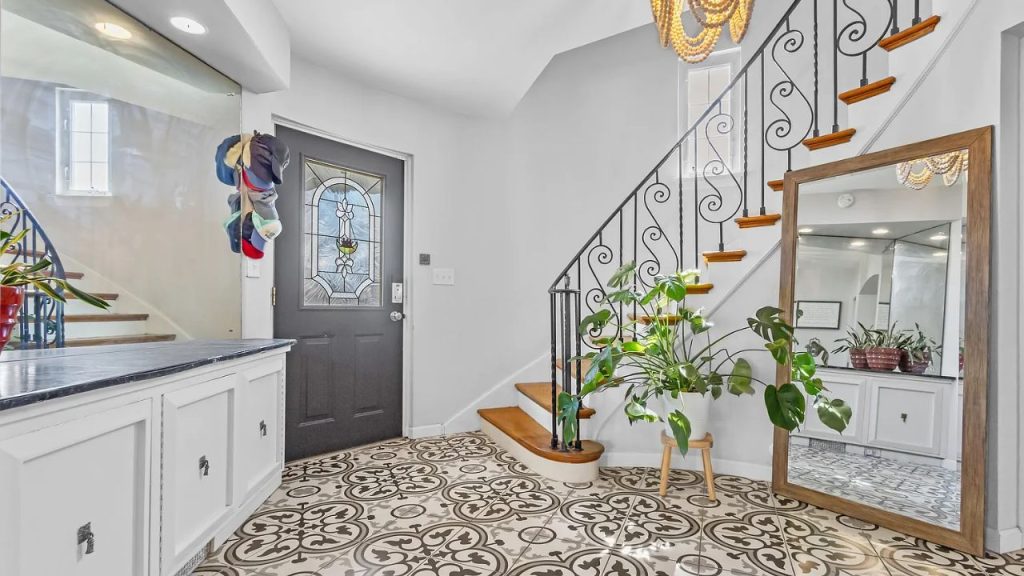 Elegant Entry with Curved Staircase