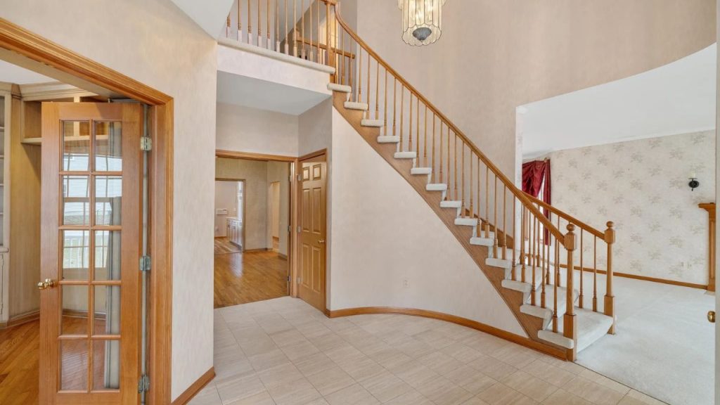 Grand Foyer with Curved Staircase