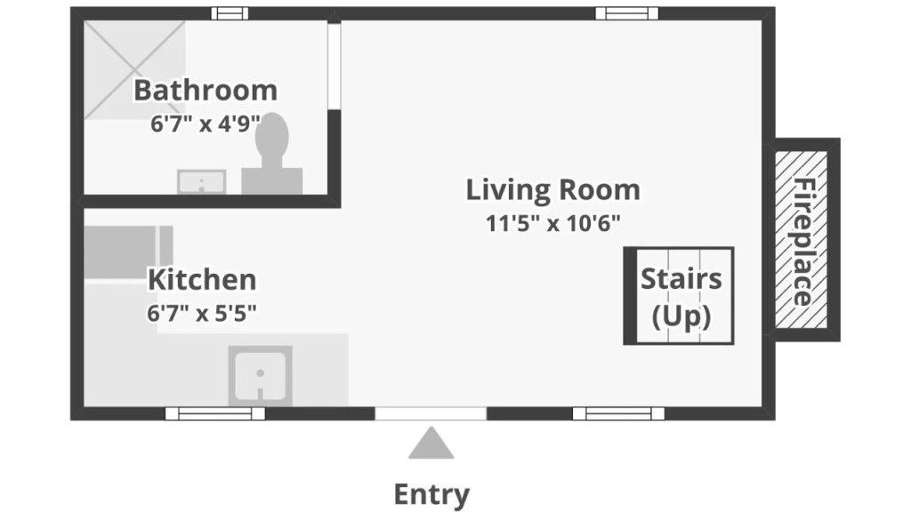 Simple floor plan with living room, kitchen, bathroom, and stairs.
