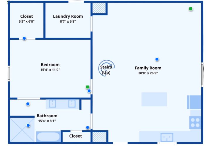 Floor plan with open family room, one bedroom, bathroom, and laundry area.