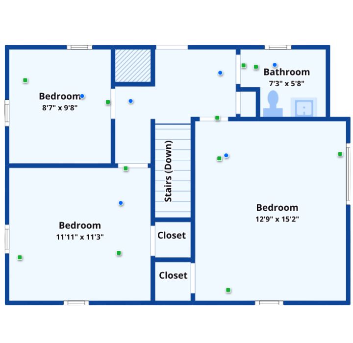 Upper floor plan with three bedrooms, central bath, and hallway closets.