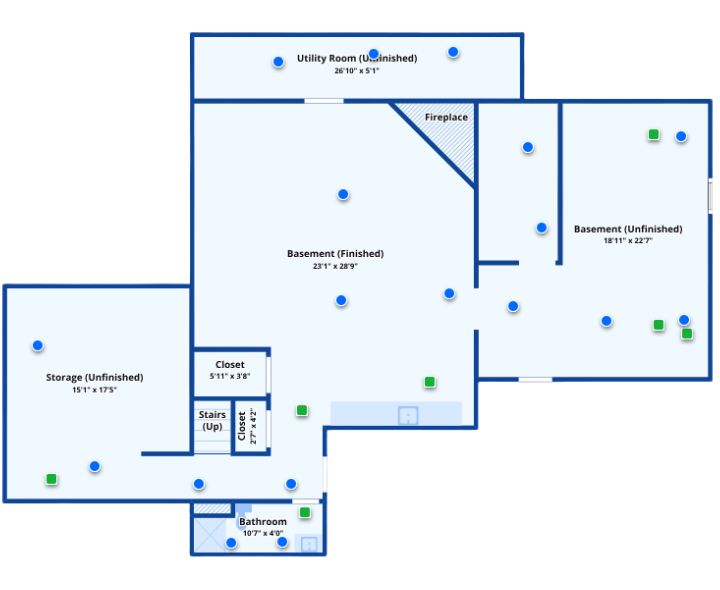 Basement floor plan showing a finished living area, fireplace, storage rooms, bathroom, and utility space.