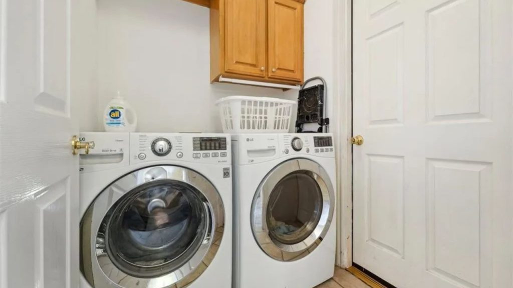 Laundry Closet with Built-In Cabinetry