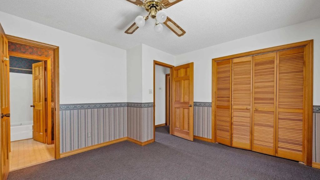 Charming Guest Bedroom with Closet