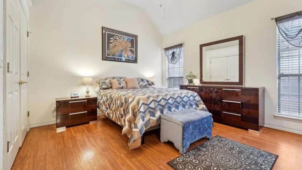 Peaceful Bedroom with Wood Floors