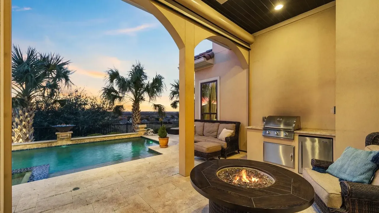 Explore This Elegant Mediterranean Retreat With Soaring Ceilings, Marble Floors, and Poolside Paradise (Floor Plan Inside)