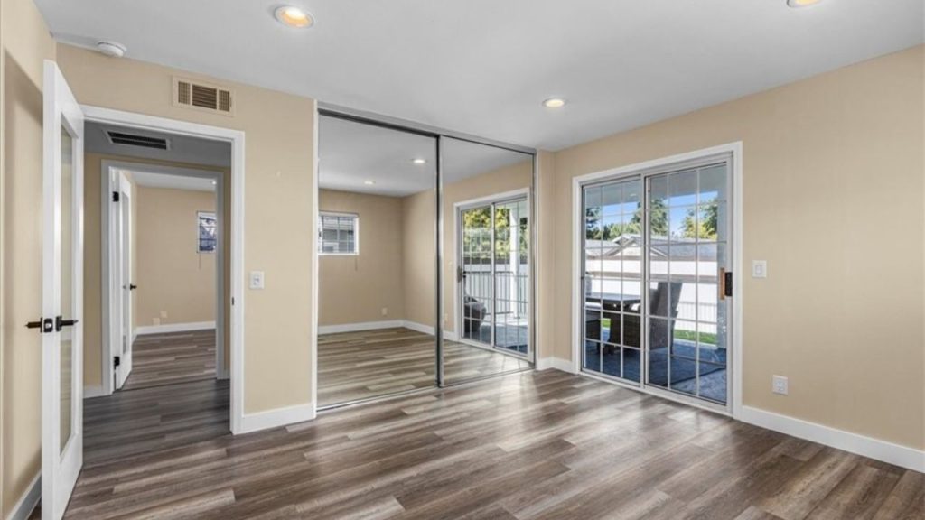 Bright Bedroom with Patio Access
