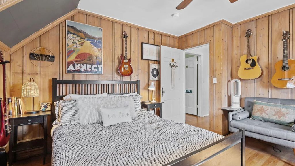 Wood-Paneled Bedroom with Musical Soul