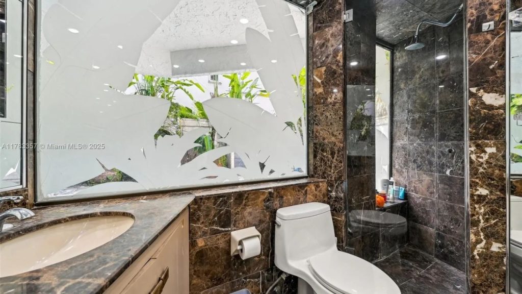 Luxurious Marble Bathroom with Garden View