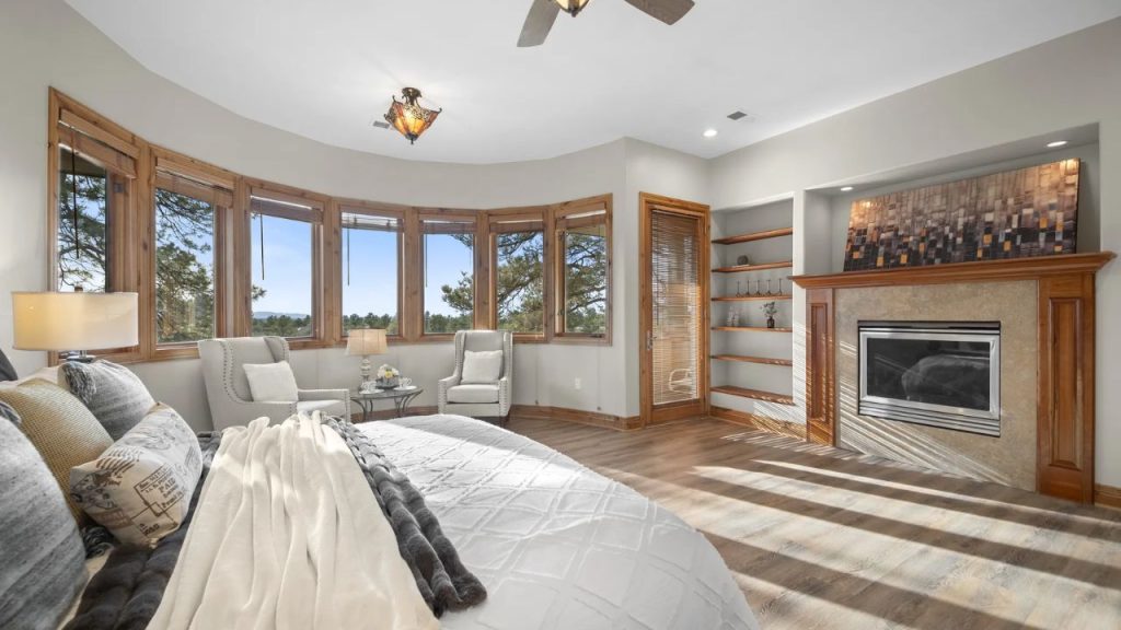 Primary Suite with Fireplace and Views