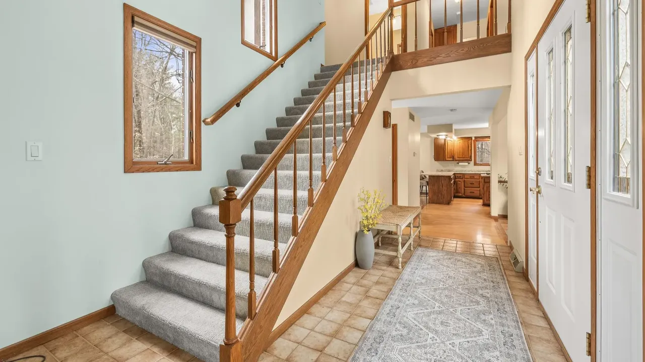 Experience Country Living in This 3-Bedroom Tudor with Garden and Wooded Trails in Stevens Point Wisconsin (Floor Plan Inside)