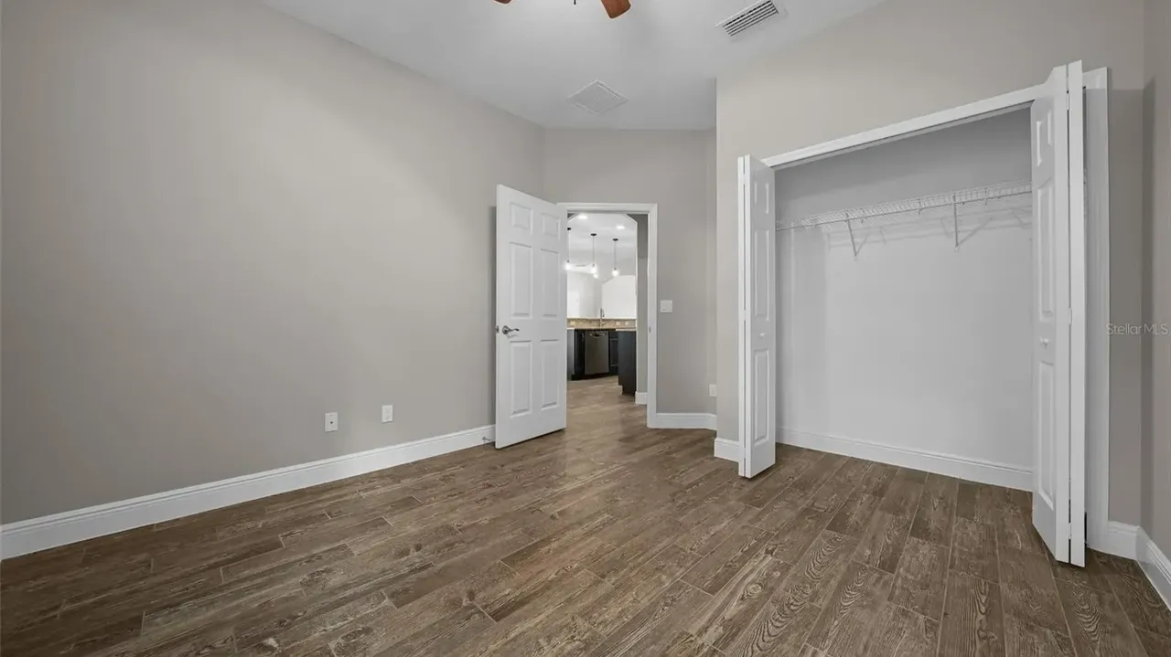 Discover This Bright and Open 3-Bedroom 1,685 Sq-Ft Ranch-Style Home with Granite Counters and Large Pantry in Groveland, FL (Floor Plan Inside)